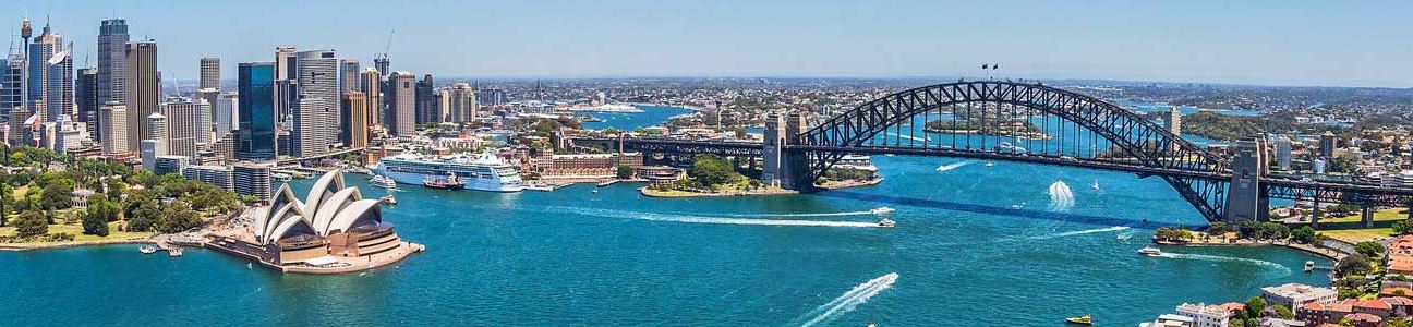 photo of ship departing Sydney Harbour on time